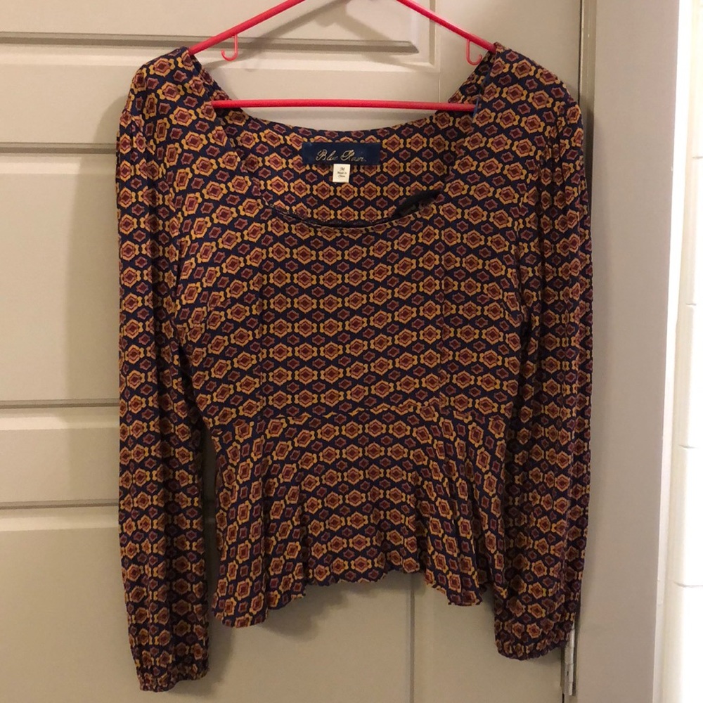Peplum long sleeve patterned shirt